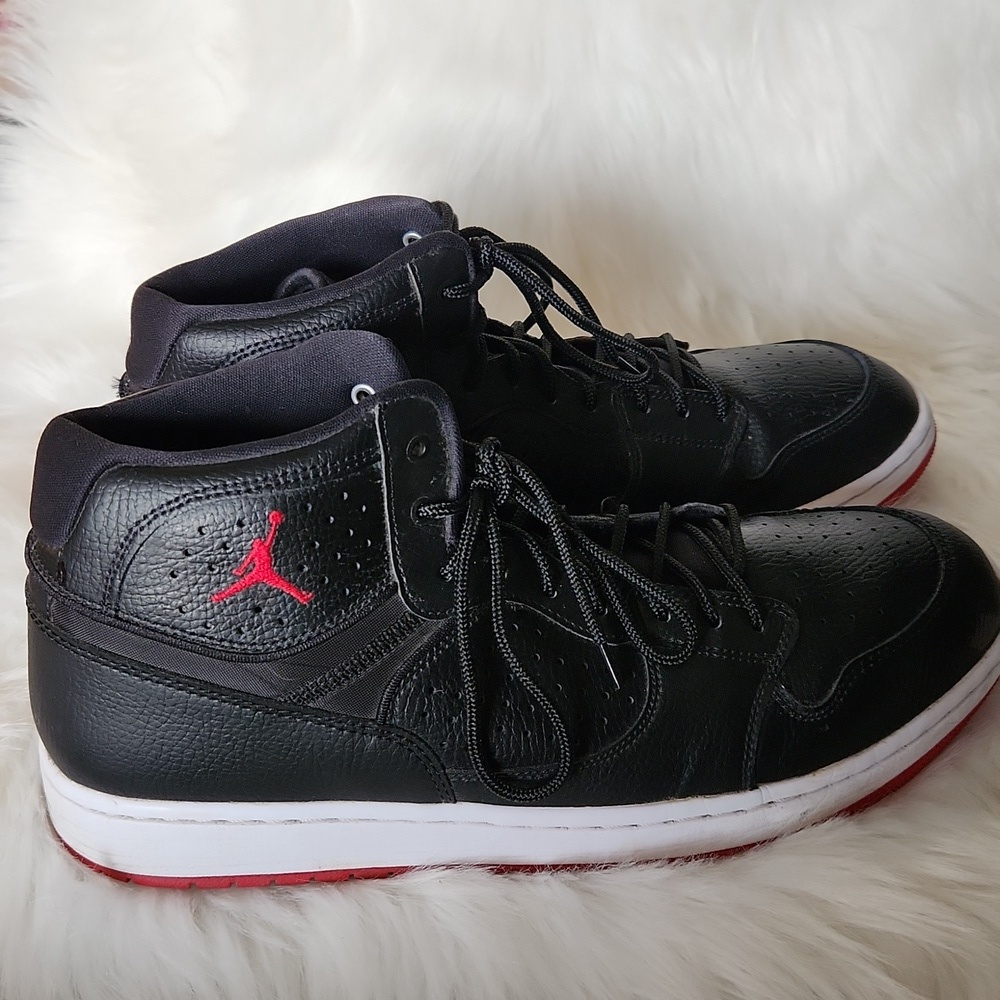 Nike Jumpmsn Black and Red High-Top Sneakers with Textured Leather